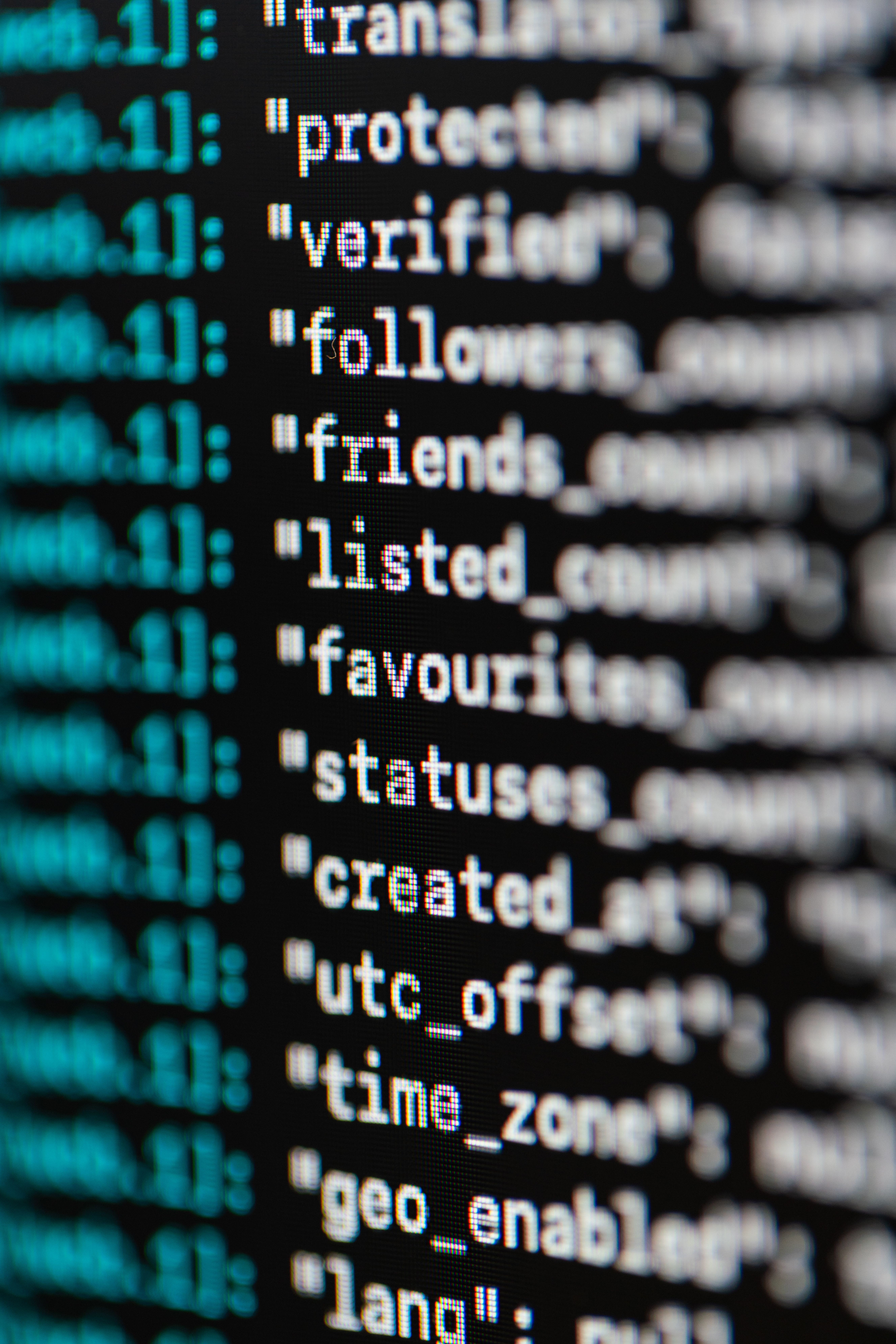 Extreme close-up of programming code on a monitor, representing web fuzzing and directory testing with tools like ffuf